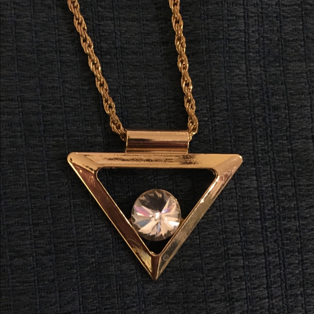 Gold necklace with triangle and diamond pendant